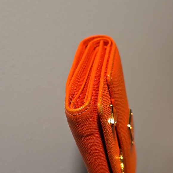 MCM Leather Orange Wallet with Gold Accents - Picture 9 of 11